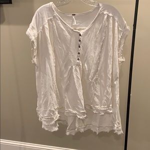 White Free People top. Flowing, high low.